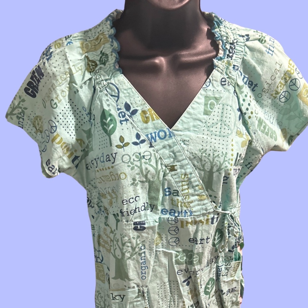 Nurse scrub top Earth Day theme.